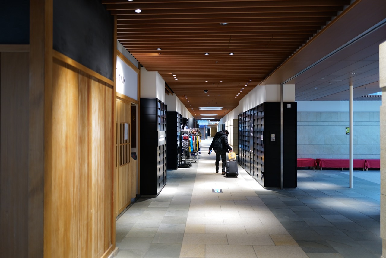 Few people walking Haneda international terminal
